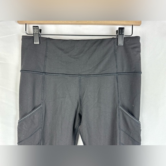Lululemon Womens Size 6 Speed Tight Solid Black Reflective Pockets - Picture 3 of 9